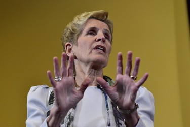 Ontario Premier Kathleen Wynne speaks to media at Legislative Assembly of Ontario in Toronto on Thursday Jan. 25, 2018. Doug Ford's promise to fire the CEO of Hydro One if elected this spring shows he has no plan to lead Ontario, Premier Kathleen Wynne said Friday, calling the Tory leader's pledge little more than "bluster." THE CANADIAN PRESS/Frank Gunn ORG XMIT: CPT135
