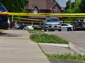 Police tape marks the scene of a deadly drive-by shooting in Brampton. Bryan Passifiume/Toronto Sun