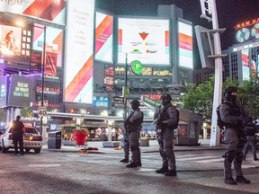 Toronto Police at the scene on Yonge St. south of Dundas St. after a man was shot dead late Wednesday, May 30, 2018. (Victor Biro photo)