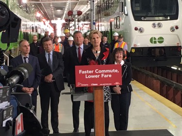 Premier Kathleen Wynne, among the dignitaries on hand Thursday April 5 2018 at the GO Transit Willowbrook Rail Maintenance Facility in Etobicoke to talk about discounted $3 GO Transit fares. (Toronto Sun/Antonella Artuso)