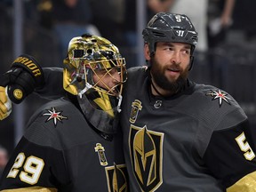 Marc-Andre Fleury, left, of the Vegas Golden Knights is congratulated by his teammate Deryk Engelland after their team's win against the Winnipeg Jets in Game Four of the Western Conference Finals during the 2018 NHL Stanley Cup Playoffs at T-Mobile Arena on May 18, 2018 in Las Vegas, Nevada. (Harry How/Getty Images)