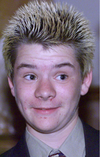 Mike Harris Jr., son of former Ontario premier Mike Harris, sports a new hairstyle for the throne speech in 1999.