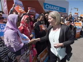 Ontario NDP leader Andrea Horwath greets supporters at a campaign event in Toronto on Tuesday, May 8, 2018.