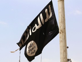 ISIS flag (DELIL SOULEIMAN/AFP/Getty Images)