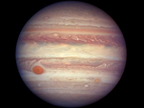 This April 3, 2017 file image made available by NASA shows the planet Jupiter when it was at a distance of about 668 million kilometres from Earth. On May 21, 2018, scientists reported that an asteroid, 2015 BZ509, sharing Jupiter’s orbit, but in reverse, actually hails from a neighbouring star system.