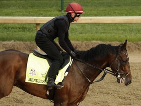 Kentucky Derby entrant Mendelssohn runs during training at Churchill Downs Thursday, May 3, 2018, in Louisville, Ky. The 144th running of the Kentucky Derby is scheduled for Saturday, May 5. (AP Photo/Charlie Riedel)