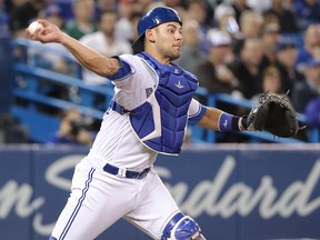 Luke Maile of the Toronto Blue Jays makes a throwing error in the fourth inning during MLB action against the Boston Red Sox at Rogers Centre on May 11, 2018 in Toronto. (Tom Szczerbowski/Getty Images)