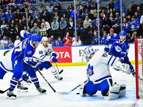 Calvin Pickard makes a pad save on Crunch's Mitchell Stephens durling last night's 7-1 Marlies win in Syracuse. (Syracuse Crunch photo)