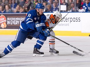 Marlies’ Andreas Johnsson (left) fights for the puck with Lehigh Valley Phantoms’ Chris Conner. Johnsson notched a pair of goals in Game 4 on Friday, May 25, 2018, in Allentown, Pa.  (Christian Bonin Photo)