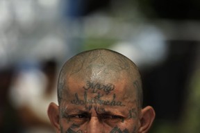 Carlos Tiberio Valladares, a.k.a. sniper, leader of the Mara Salvatrucha gang, attends a press conference at the Female Jail in San Salvador, El Salvador on Sept. 24, 2012. (JOSE CABEZAS/AFP/Getty Images)