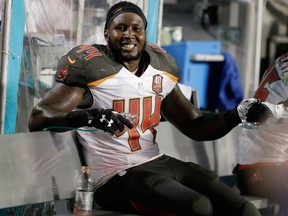 n this Sept. 3, 2015, file photo, then-Tampa Bay Buccaneers linebacker Khaseem Greene (44) sits on the sidelines after an interception during the first half of an NFL preseason football game against the Miami Dolphins, in Miami Gardens, Fla.
