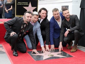 Chris Kirkpatrick, Lance Bass, JC Chasez, Joey Fatone, and Justin Timberlake at the NSYNC star ceremony on the Hollywood Walk of Fame in Los Angeles on April 30, 2018. (Nicky Nelson/WENN.com)