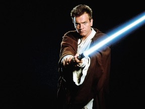 Actor Ewan McGregor strikes a pose as Obi-Wan Kenobi in Star Wars: Episode I The Phantom Menace.