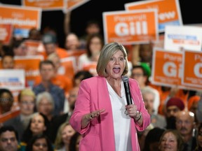 CORRECTS SPELLING OF HORWATH Provincial NDP Leader Andrea Horwath speaks to a packed room of supporters at an NDP rally in Brampton, Monday, May 21, 2018.