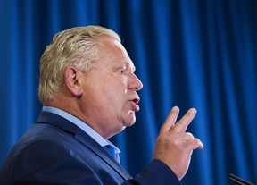 Ontario PC Leader Doug Ford makes a campaign stop at the Royal Canadian Legion in Pickering Ont., on Tuesday, May 22, 2018. THE CANADIAN PRESS/Nathan Denette