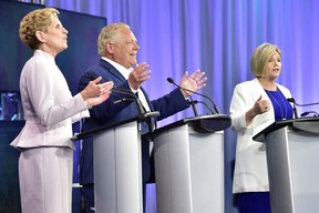 Ontario Liberal Leader Kathleen Wynne, left, Ontario Progressive Conservative Leader Doug Ford, and Ontario NDP Leader Andrea Horwath take part in the the third and final televised debate of the provincial election campaign in Toronto on Sunday. Frank Gunn/The Canadian Press