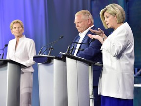 Ontario Liberal Leader Kathleen Wynne, left to right, Ontario Progressive Conservative Leader Doug Ford and Ontario NDP Leader Andrea Horwath participate during the third and final televised debate of the provincial election campaign in Toronto ORG XMIT: FNG520