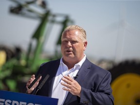 Ontario PC Leader Doug Ford makes an announcement during a campaign stop on a farm in the town of Lakeshore, Ont. on Wednesday, May 23, 2018. THE CANADIAN PRESS/ Geoff Robins