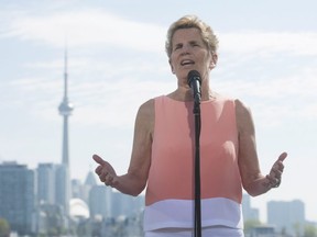 Ontario Liberal Leader Kathleen Wynne speaks to reporters at Ontario Place in Toronto, Friday, May 25, 2018. THE CANADIAN PRESS/Marta Iwanek