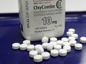 OxyContin pills arranged for a photo at a pharmacy. (AP Photo/Toby Talbot file)