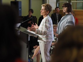 Premier Kathlenen Wynne speaks at Ecole secondaire publique Louis-Riel in Ottawa on April 30, 2018. (Raven McCoy/Postmedia)