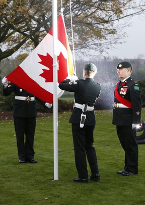 Canadian soldiers lower the flag during a 2017 Remembrance Day ceremony in Belgium at a memorial on Canadalaan (Canada Lane) that honours our troops who died in the Battle of Passchaendale.