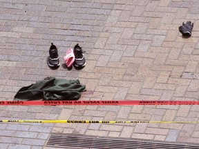 Clothing is strewn on the sidewalk at the scene where pedestrians were hit by a motorist in Portland, Ore., Friday, May 25, 2018.