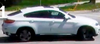 Investigators need help tracking down this white BMW that they suspect was involved in the deadly shooting of Christopher Reid, 38, on Monday, May 7, 2018. (Photo supplied by Toronto police)