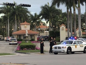 Police respond to The Trump National Doral resort after reports of a shooting inside the resort Friday, May 18, 2018 in Doral, Fla.