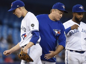 Toronto Blue Jays starting pitcher Aaron Sanchez is taken out of the game by manager John Gibbons in Toronto on May 17, 2018