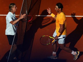 Rafael Nadal of Spain shakes hands after victory in his match against Denis Shapovalov of Canada during the Italian Open at Foro Italico on May 17, 2018