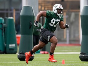 New York Jets' Nathan Shepherd, who was drafted in the third round of the 2018 draft, works out during NFL rookie camp, Saturday, May 5, 2018, in Florham Park, N.J. (AP Photo/Julio Cortez)
