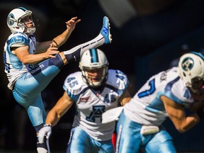 Toronto Argonauts kicker Swayze Waters punts the ball against the Ottawa RedBlacks during the first half of CFL football action in Toronto, Sunday August 23, 2015. (THE CANADIAN PRESS/Mark Blinch)