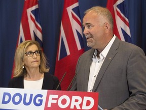 PC candidates Gila Martow, left, and Todd Smith highlight the social media history of NDP candidate Tasleem Riaz, at the downtown Sheraton Hotel, in Toronto on Friday May 25, 2018. Stan Behal/Toronto Sun