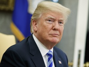 In this May 16, 2018, file photo, President Donald Trump listens to a question during a meeting in the Oval Office of the White House in Washington. (AP Photo/Evan Vucci, File)