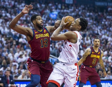 Toronto Raptors DeMar DeRozan during 1st half action against Cleveland Cavaliers Tristan Thompson in Eastern Conference Semifinals at the Air Canada Centre at the Air Canada Centre in Toronto, Ont. on Tuesday May 1, 2018. Ernest Doroszuk/Toronto Sun/Postmedia Network