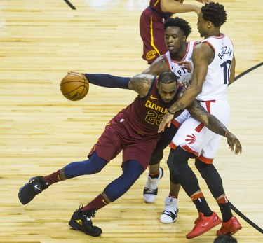 Toronto Raptors OG Anunoby and DeMar DeRozan during 1st half action against Cleveland Cavaliers LeBron James in Eastern Conference Semifinals at the Air Canada Centre at the Air Canada Centre in Toronto, Ont. on Tuesday May 1, 2018. Ernest Doroszuk/Toronto Sun/Postmedia Network