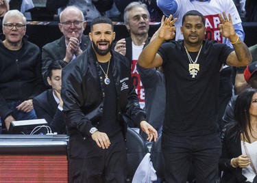 Rapper Drake watches the Toronto Raptors during 1st half action against Cleveland Cavaliers in Eastern Conference Semifinals at the Air Canada Centre at the Air Canada Centre in Toronto, Ont. on Tuesday May 1, 2018. Ernest Doroszuk/Toronto Sun/Postmedia Network