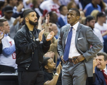 Toronto Raptors head coach Dwane Casey and rapper Drake during 4th quarter action against Cleveland Cavaliers in Eastern Conference Semifinals at the Air Canada Centre at the Air Canada Centre in Toronto, Ont. on Tuesday May 1, 2018. Ernest Doroszuk/Toronto Sun/Postmedia Network