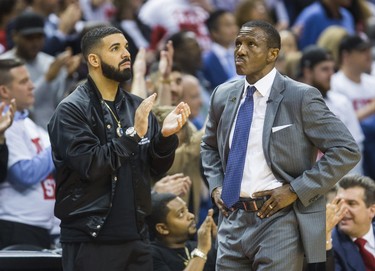 Toronto Raptors head coach Dwane Casey and rapper Drake during 4th quarter action against Cleveland Cavaliers in Eastern Conference Semifinals at the Air Canada Centre at the Air Canada Centre in Toronto, Ont. on Tuesday May 1, 2018. Ernest Doroszuk/Toronto Sun/Postmedia Network
