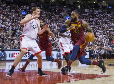 Toronto Raptors Jakob Poeltl during 4th quarter action against Cleveland Cavaliers LeBron James in Eastern Conference Semifinals at the Air Canada Centre at the Air Canada Centre in Toronto, Ont. on Tuesday May 1, 2018. Ernest Doroszuk/Toronto Sun/Postmedia Network