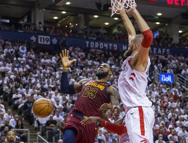 Toronto Raptors Jonas Valanciunasduring 4th quarter action against Cleveland Cavaliers LeBron James in Eastern Conference Semifinals at the Air Canada Centre at the Air Canada Centre in Toronto, Ont. on Tuesday May 1, 2018. Ernest Doroszuk/Toronto Sun/Postmedia Network