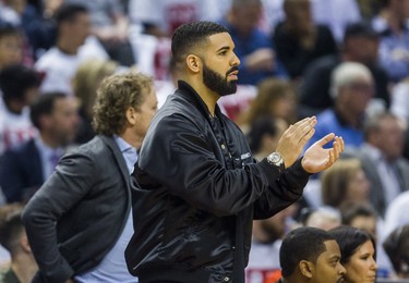 Rapper Drake, a global ambassador for the Toronto Raptors watches playoff action against the Cleveland Cavaliers at the Air Canada Centre at the Air Canada Centre in Toronto, Ont. on Tuesday May 1, 2018. Ernest Doroszuk/Toronto Sun/Postmedia Network