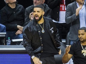 Rapper Drake, a global ambassador for the Toronto Raptors watches playoff action against the Cleveland Cavaliers at the Air Canada Centre at the Air Canada Centre in Toronto, Ont. on Tuesday May 1, 2018. Ernest Doroszuk/Toronto Sun/Postmedia Network