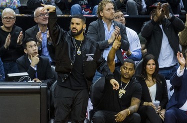 Rapper Drake, a global ambassador for the Toronto Raptors watches playoff action against the Cleveland Cavaliers at the Air Canada Centre at the Air Canada Centre in Toronto, Ont. on Tuesday May 1, 2018. Ernest Doroszuk/Toronto Sun/Postmedia Network