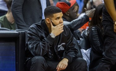 Rapper Drake, a global ambassador for the Toronto Raptors watches playoff action against the Cleveland Cavaliers at the Air Canada Centre at the Air Canada Centre in Toronto, Ont. on Tuesday May 1, 2018. Ernest Doroszuk/Toronto Sun/Postmedia Network