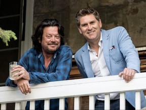The Hip’s rhythm guitarist Paul Langlois wth Up Cannabis CEO Jay Wilgar on the front porch of the band’s The Bathouse recording studio.)