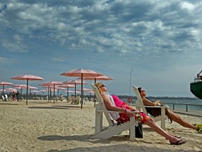 Sunbathers at Sugar Beach in Toronto. Dave Abel/Toronto Sun