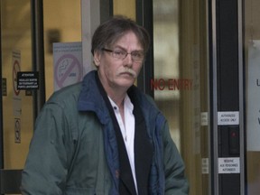 Gary Willett Sr. leaves the  University Court house on Nov. 30, 2017. (Stan Behal/Toronto Sun)
