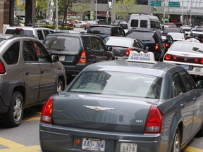 Traffic is gridlocked on southbound University Ave. (Toronto Sun files)